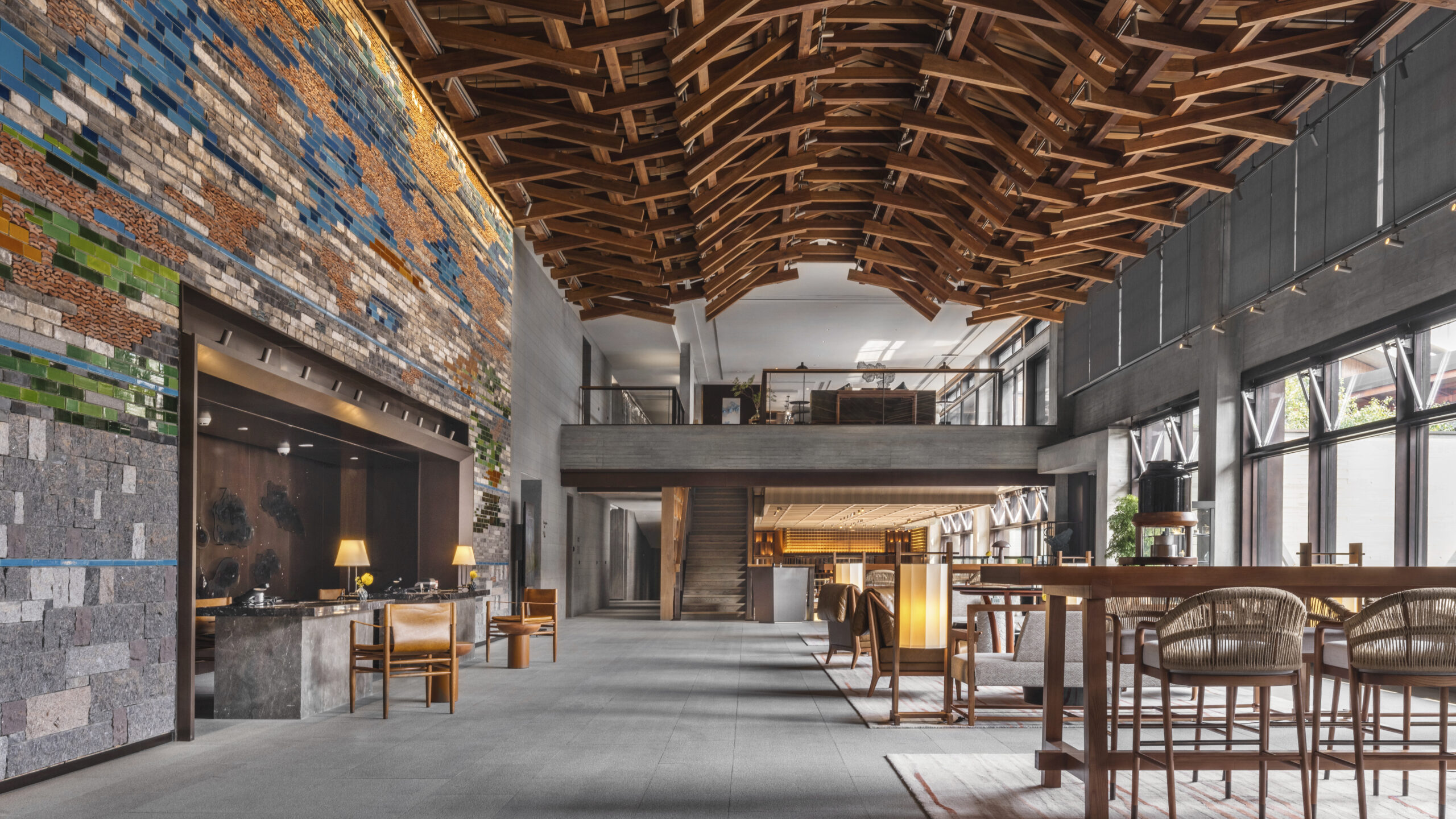 reception area at yanbai villa with a wall made from recycled tiles