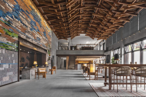 reception area at yanbai villa with a wall made from recycled tiles