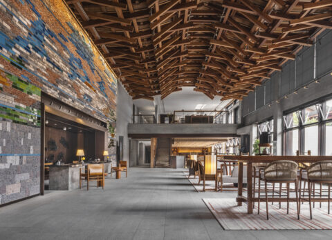 reception area at yanbai villa with a wall made from recycled tiles