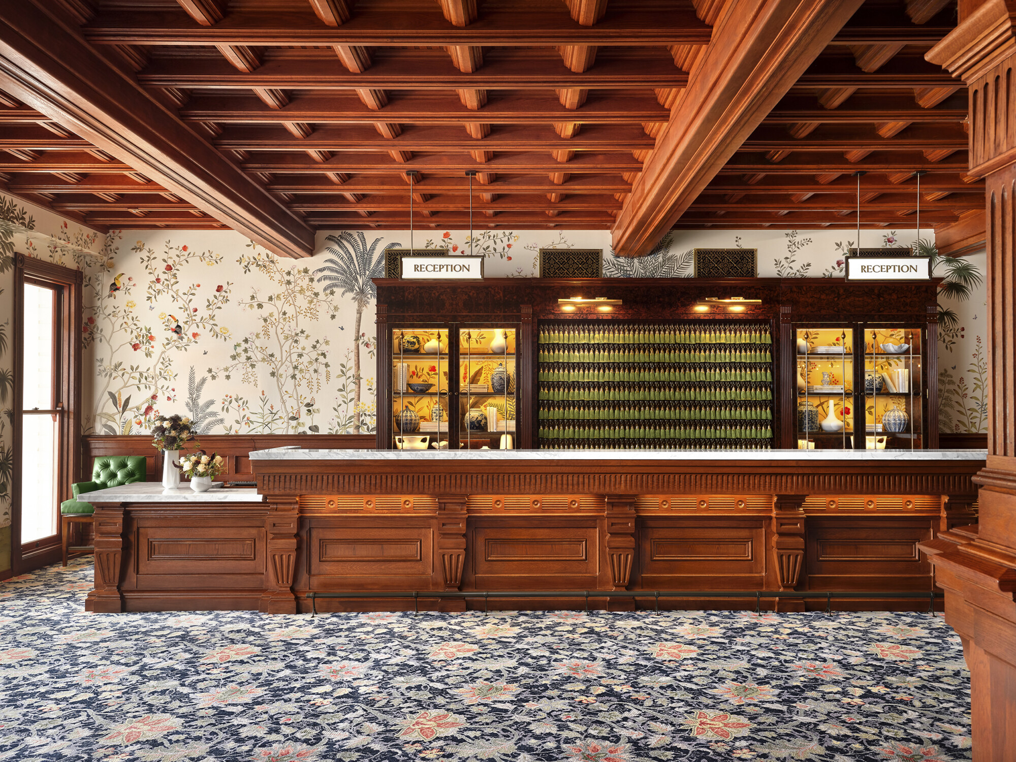 hotel del doronado lobby and reception area, looking toward desk with floral wallpaper and tassel keyrings. integrated design. - 2023 Wrapped: A Year in Review