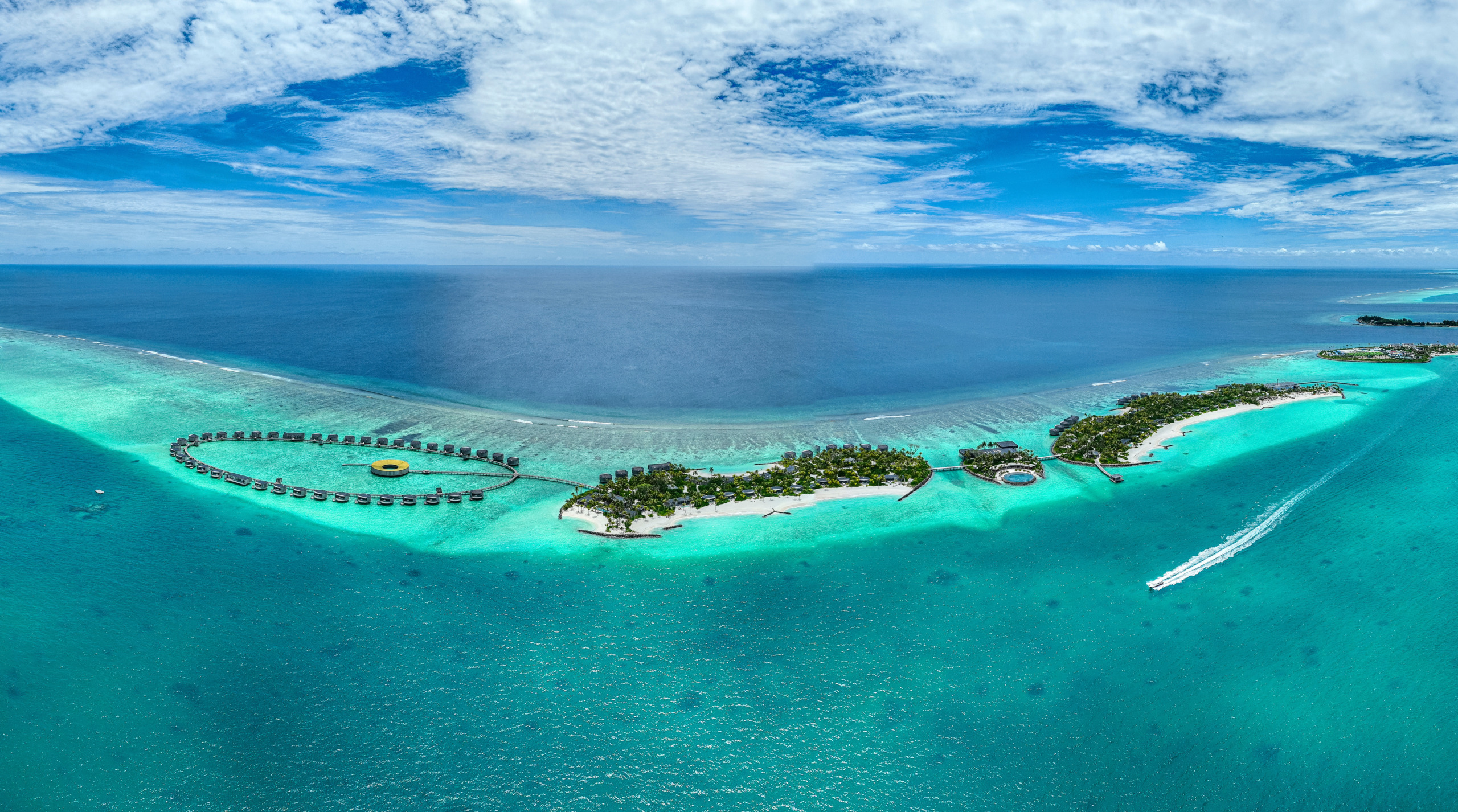 back-of-house design Panoramic aerial view of a boat sailing along the coast of Fari Island, Maldives. Aerial, Fari Island, Indian Ocean, Island, Laccadive Sea, Nature, Ocean, Panorama, Resort, Sand, Travel, Water, above, archipelagos, atoll, beach, beautiful, bird's eye view, boat, building, bungalow, coast, drone, high, holiday, hotel, idyllic, luxury, luxury resort, maldives, motorboat, navigating, over, overhead, panoramic, paradise, perspective, sail boat, sailing, sea, seascape, shore, shoreline, tourism, travel destinations, tropical, turquoise, vacation, view, maldives, archipelagos, aerial, above, drone, overhead, view, beautiful, bird's eye view, perspective, high, travel, over, water, nature, sea, ocean, island, paradise, idyllic, turquoise, holiday, panorama, resort, sand, seascape, tropical, vacation, travel destinations, atoll, luxury resort, bungalow, hotel, luxury, building, tourism, indian ocean, laccadive sea, boat, motorboat, sail boat, sailing, navigating, panoramic, beach, coast, shoreline, shore, fari island.