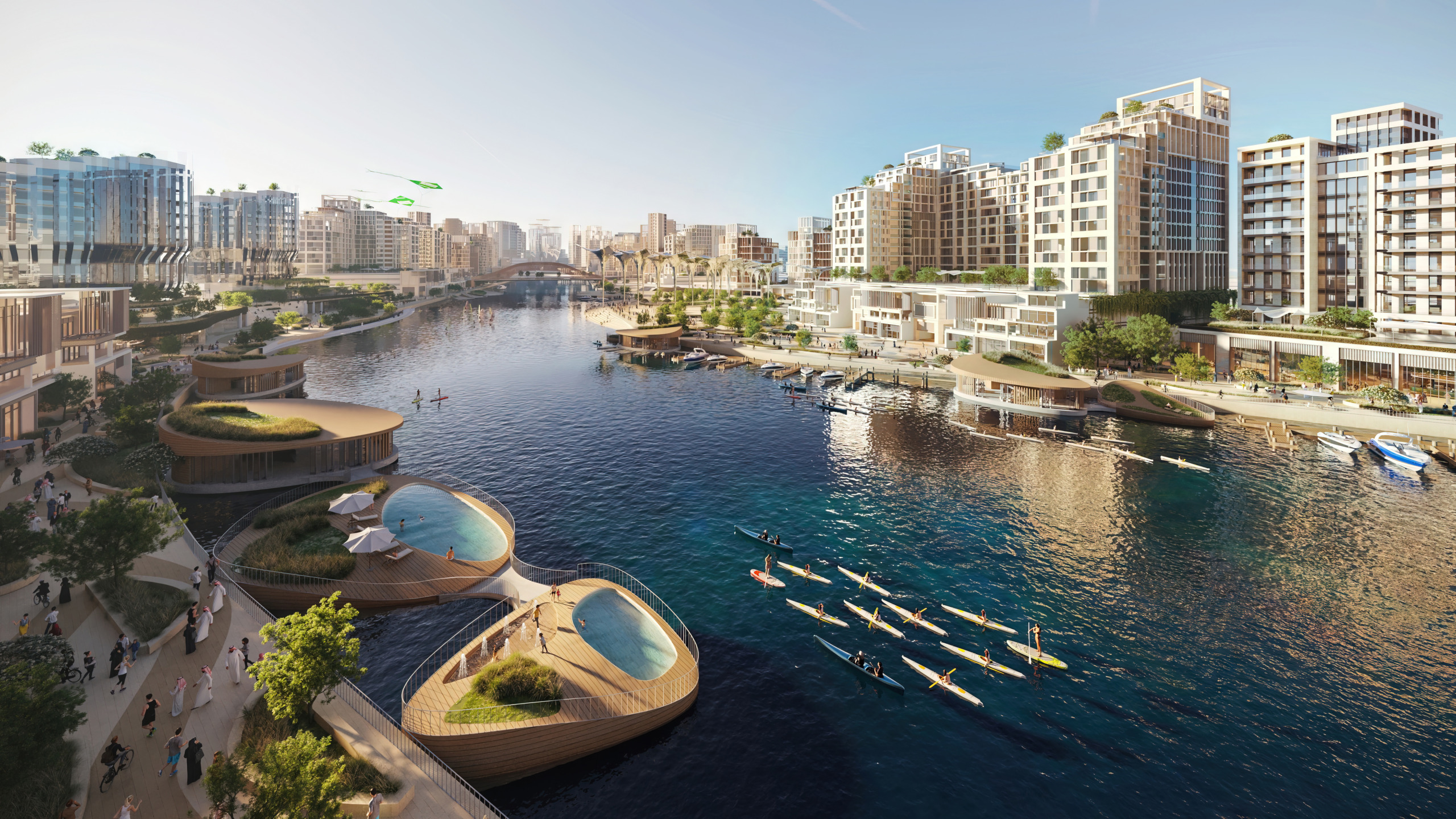 Daytime rendering of MARAFY's canal with floating wellness pods featuring plunge pools, surrounded by kayakers and paddleboarders, framed by mixed-use buildings and a waterfront promenade.